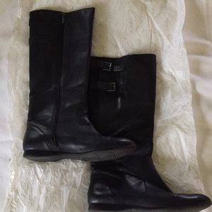 Women’s size 12 Black leather, side zip boots